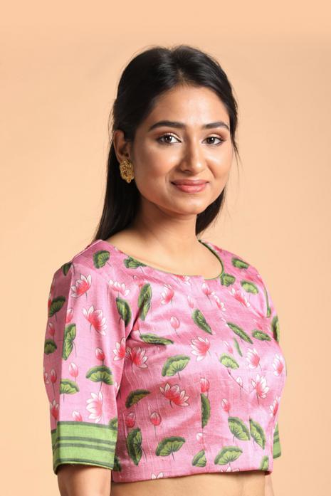 Pink coloured Pichwai printed blouse crafted from luxurious raw silk fabric.