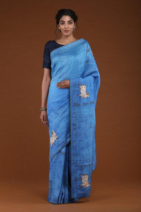 A handwoven tussar linen fabric saree in blue colour 