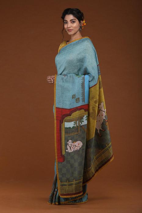 A handwoven tussar linen fabric saree in light blue colour 