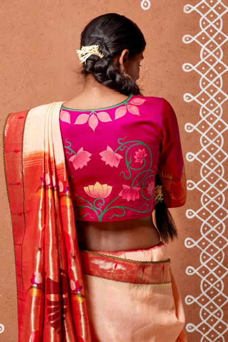 Magenta coloured Pichwai handpainted blouse crafted from luxurious paithani silk fabric.