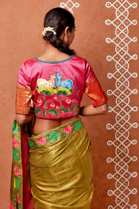 Pink coloured Pichwai handpainted blouse crafted from luxurious paithani silk fabric.