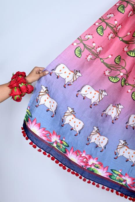Printed Pichwai designs pink coloured dupatta on handwoven Tussar linen fabric.