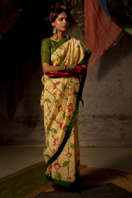 A handwoven tussar linen fabric saree in lemon colour 