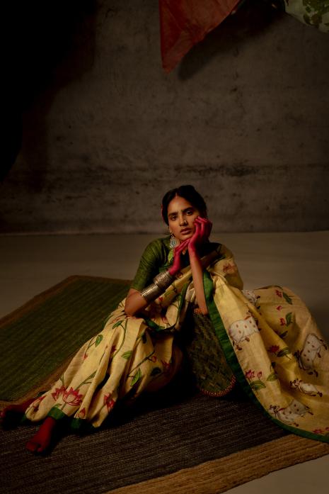 A handwoven tussar linen fabric saree in lemon colour 