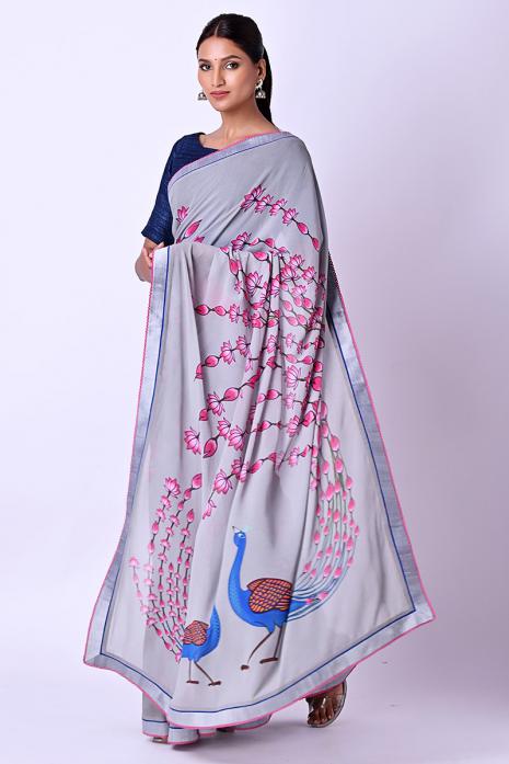 A georgette fabric saree in grey colour 