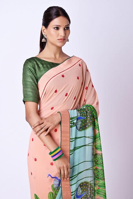 A  georgette fabric saree in pink colour 