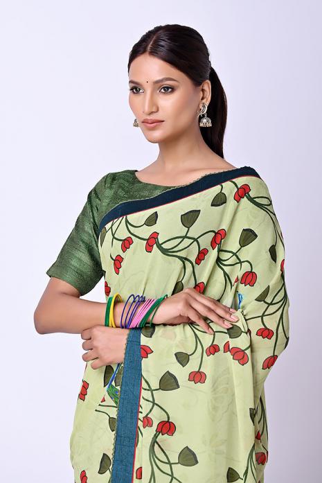 A  georgette fabric saree in green colour