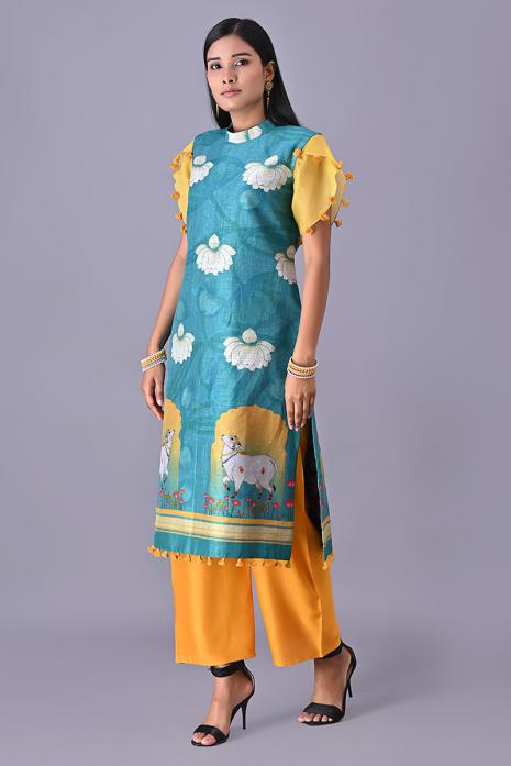 Blue coloured Tussar linen tunics with printed Pichwai motifs and elegant organza sleeves.