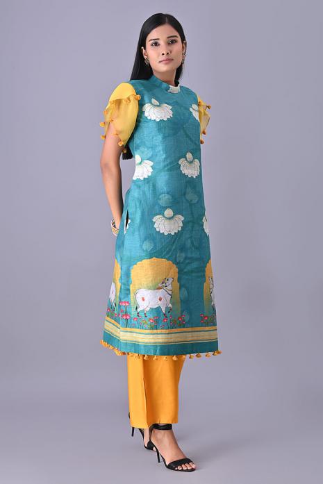 Blue coloured Tussar linen tunics with printed Pichwai motifs and elegant organza sleeves.