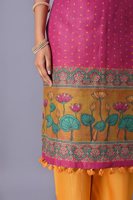 Fuchsia coloured Tussar linen tunics with printed Pichwai motifs and elegant organza sleeves.