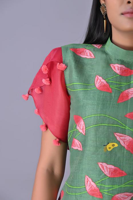 Green coloured Tussar linen tunics with printed Pichwai motifs and elegant organza sleeves.