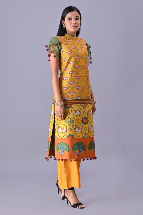 Yellow coloured Tussar linen tunics with printed Pichwai motifs and elegant organza sleeves.
