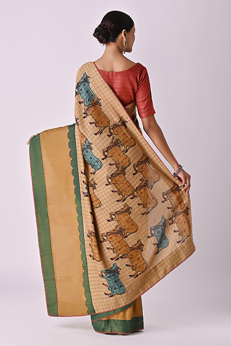 A vibrant collection of handcrafted sarees with intricate Kalamkari artistry and rich color palettes, perfect for traditional and artistic fashion enthusiasts.