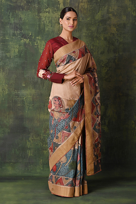 A vibrant collection of multi coloured handcrafted sarees with intricate Kalamkari artistry