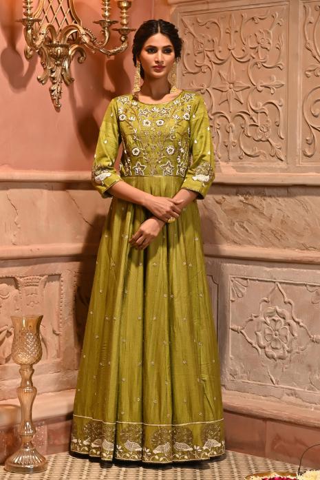 A beautiful print and hand-embroidered gown in green colour
