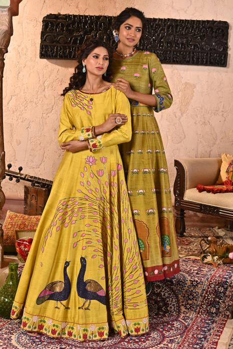A beautiful print and hand-embroidered gown in yellow colour