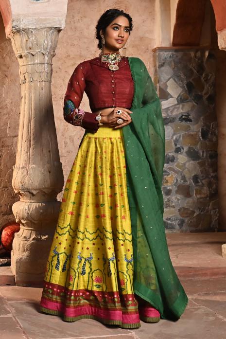 A beautiful hand-painted and hand-embroidered lehenga set in yellow colour