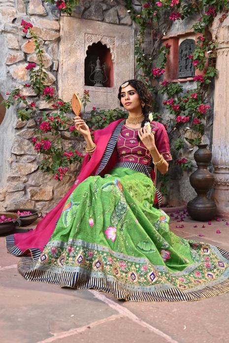 A beautiful hand-painted and hand-embroidered lehenga set in green colour 