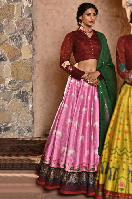 A beautiful hand-painted and hand-embroidered lehenga set in pink colour 