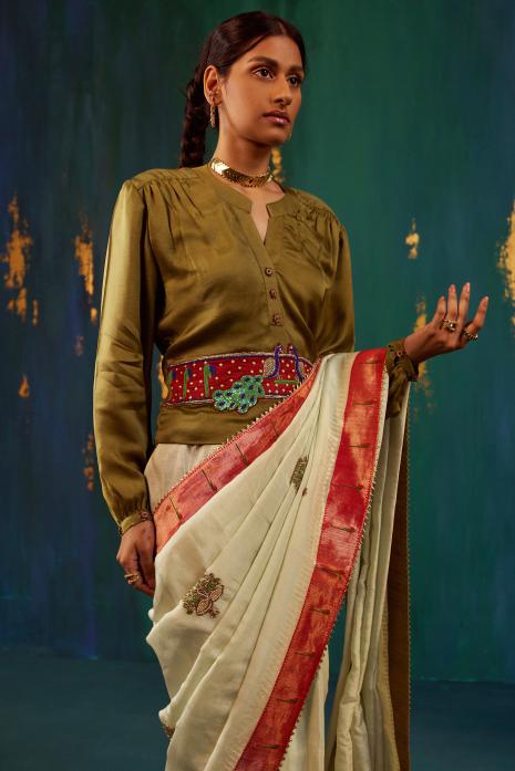 A beautiful fusion handwoven Paithani saree in light green colour