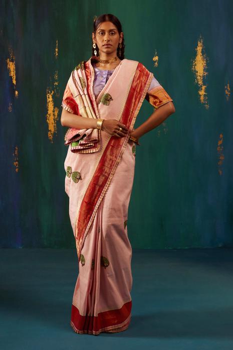 A beautiful fusion handwoven Paithani saree in light pink colour