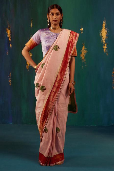 A beautiful fusion handwoven Paithani saree in light pink colour