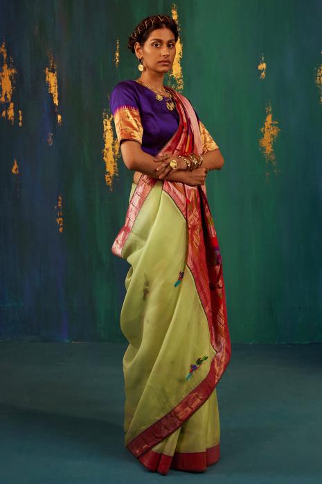A beautiful fusion handwoven Paithani saree in green colour