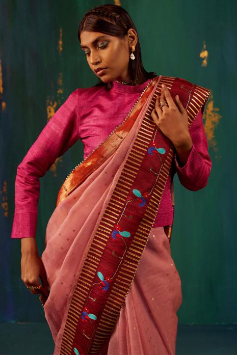 A beautiful fusion handwoven Paithani saree in pink colour