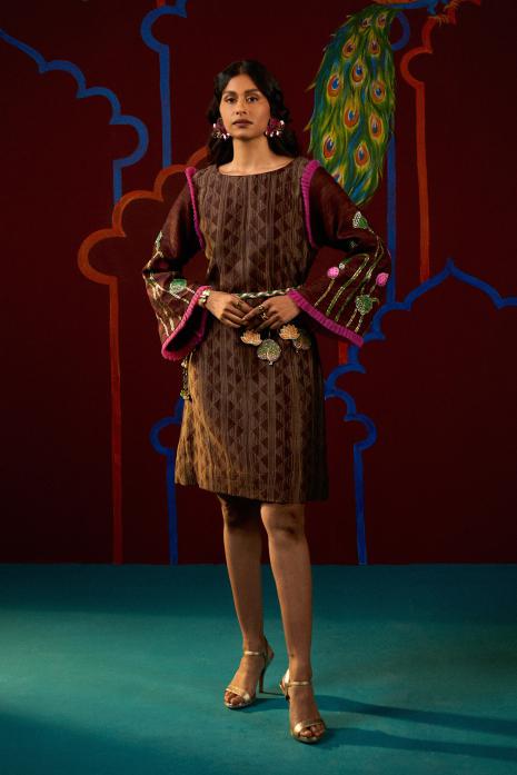 Brown coloured hand-painted Pichwai tunics on organza, ghicha silk & chanderi,  featuring intricate traditional Pichwai artistry and vibrant colors.