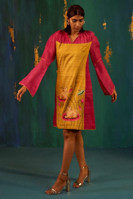 Yellow & Pink coloured hand-painted Pichwai tunics on organza, ghicha silk & chanderi, featuring intricate traditional Pichwai artistry and vibrant colors.