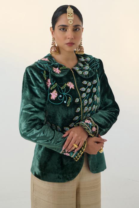 A green and beige co-ord set adorned with Pichwai embroidery, created from luxurious velvet and tussar fabric