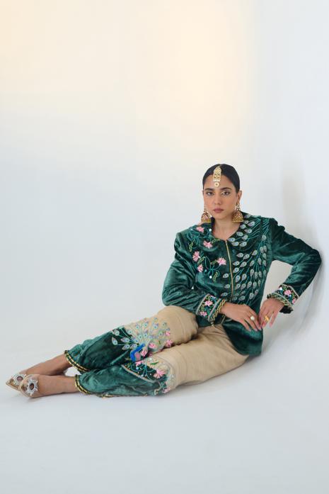 A green and beige co-ord set adorned with Pichwai embroidery, created from luxurious velvet and tussar fabric