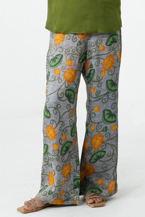 Grey coloured print Pichwai pants featuring intricate Pichwai motifs in vibrant colours.
