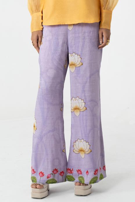 Purple coloured print Pichwai pants featuring intricate Pichwai motifs in vibrant colours.