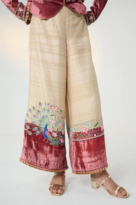 Rust and Beige coloured print Pichwai pants featuring intricate Pichwai motifs in vibrant colours.