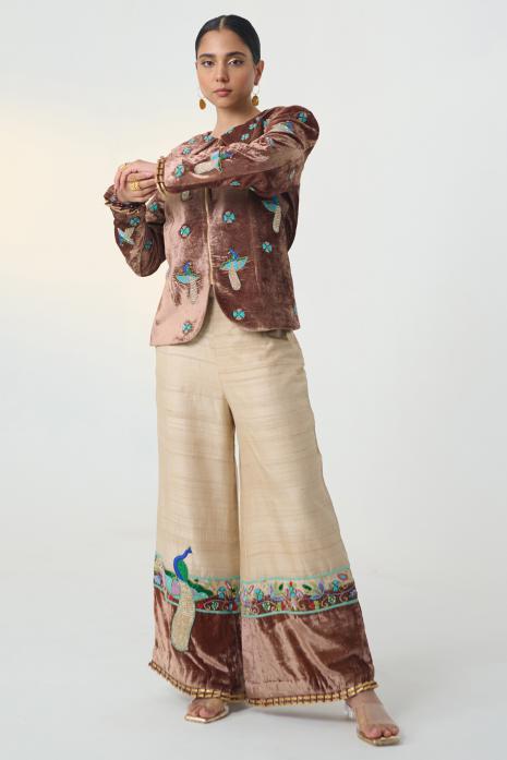 Brown and Beige coloured print Pichwai pants featuring intricate Pichwai motifs in vibrant colours.