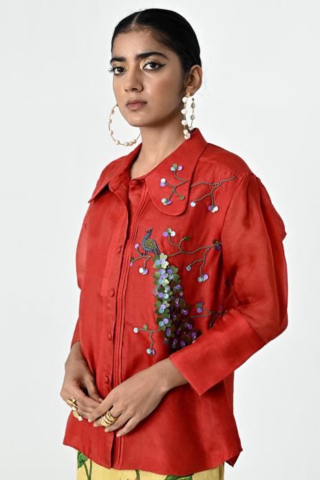 Red coloured hand-embroidered organza fabric top featuring Intricate Pichwai Motifs