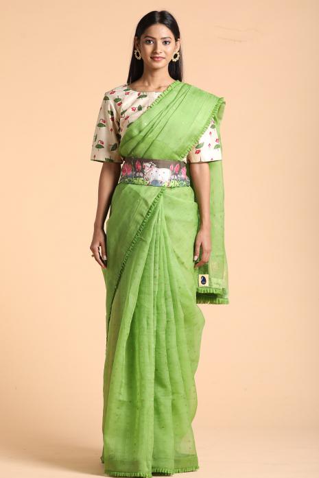 A handwoven tussar linen fabric saree in green colour