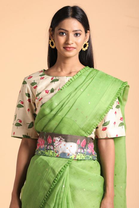 A handwoven tussar linen fabric saree in green colour
