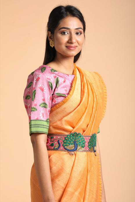 A handwoven tussar linen fabric saree in orange colour