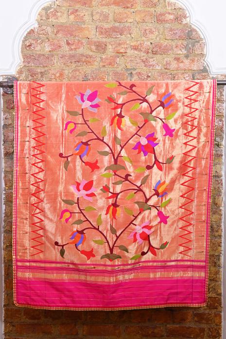 A vibrant Paithani dupatta in golden colour featuring intricate Pichwai art, created from luxurious silk