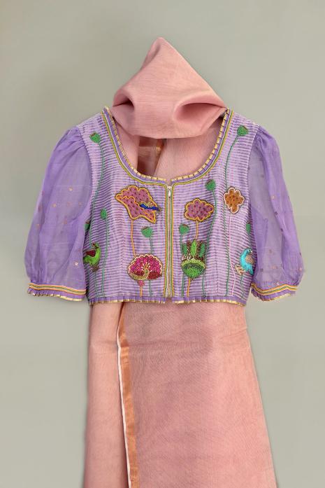 Mauve coloured Pichwai hand emroidered blouse crafted from luxurious tussar silk fabric.