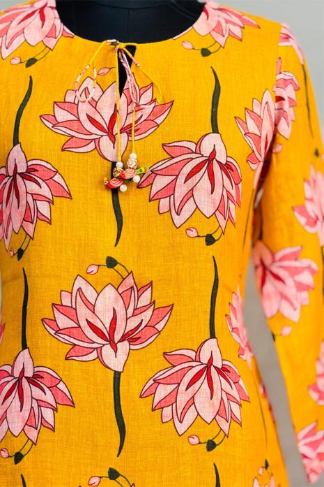 Yellow coloured print pichwai linen fabric Tunic featuring Intricate Pichwai lotus Motifs