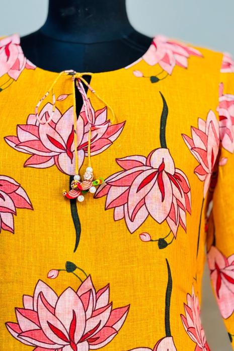 Yellow coloured print pichwai linen fabric Tunic featuring Intricate Pichwai lotus Motifs