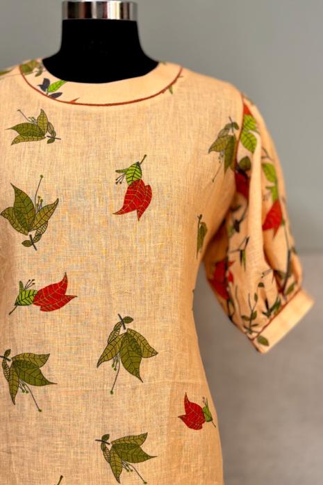 Peach coloured print pichwai linen fabric Tunic featuring Intricate Bougainvillea Motifs