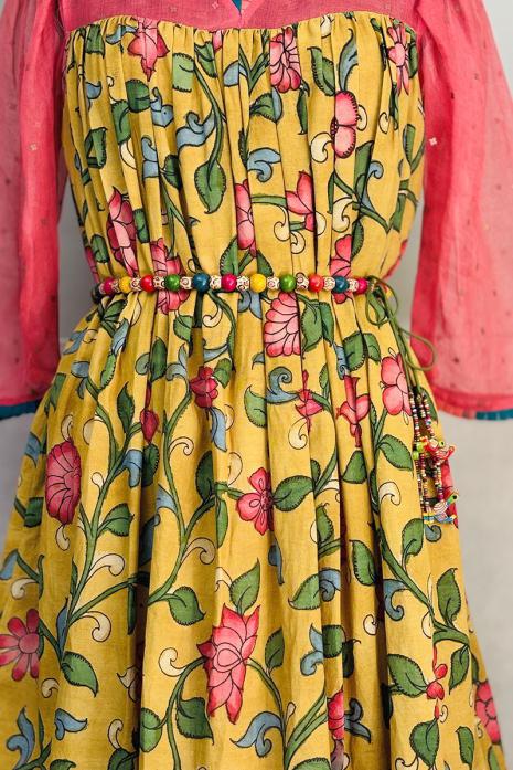 Yellow coloured kalamkari pichwai silk  & Organza  fabric Tunic featuring Intricate Pichwai Motif