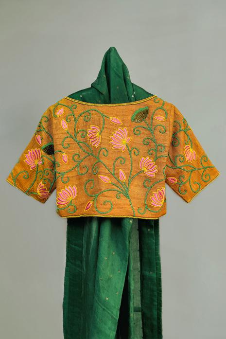 Mustard coloured Pichwai hand emroidered blouse crafted from luxurious ghicha fabric.