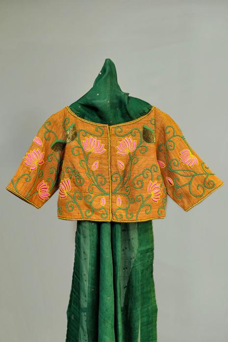 Mustard coloured Pichwai hand emroidered blouse crafted from luxurious ghicha fabric.