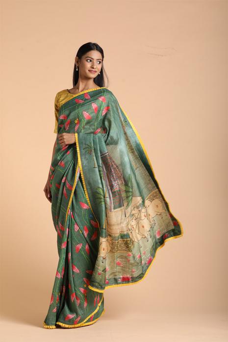 A handwoven tussar linen fabric saree in green colour with a beautiful intricate print featuring traditional Pichwai motifs.