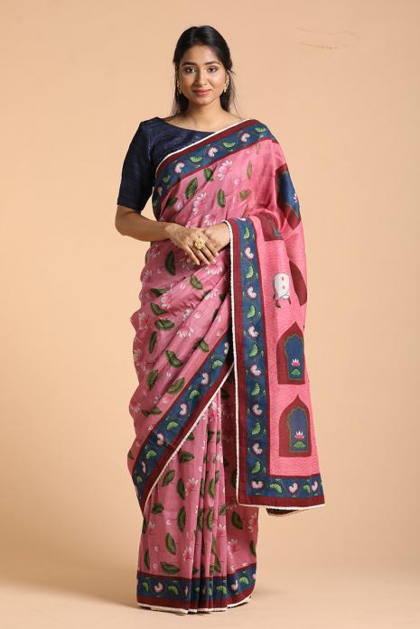 A handwoven tussar linen fabric saree in pink colour with a beautiful intricate print featuring traditional Pichwai motifs.